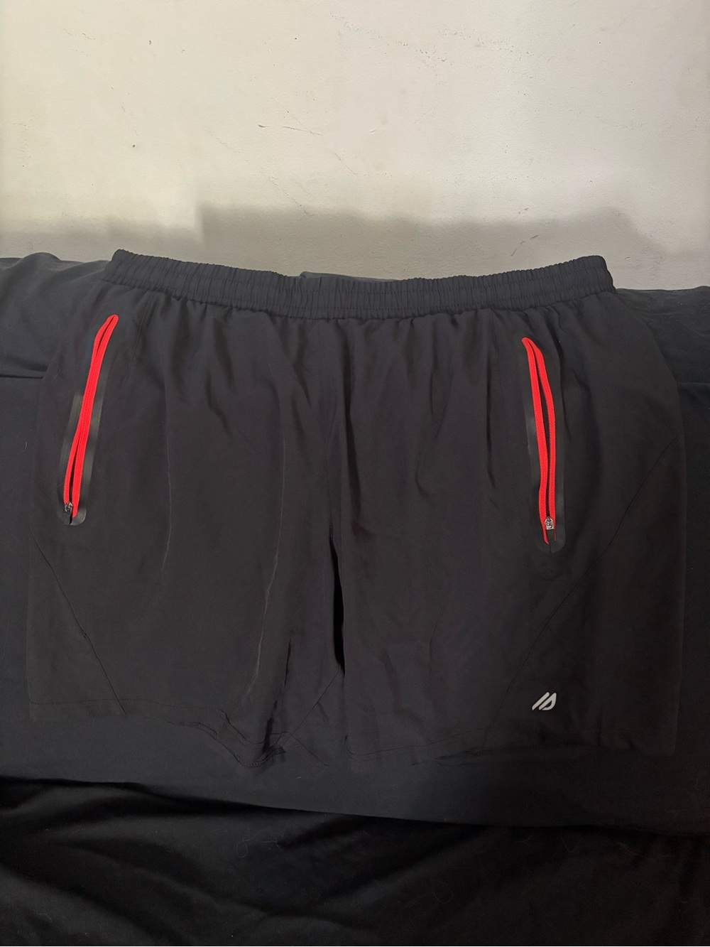 Eddie Bauer Black Performance Shorts with Red Zip Accents